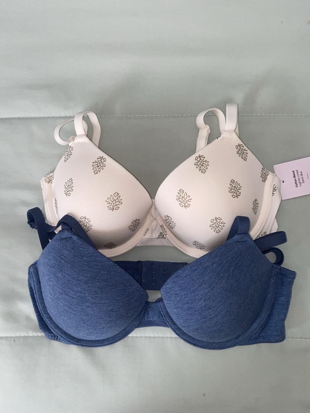 Auden Two-Pack T-Shirt Bras in Blue and Cream.